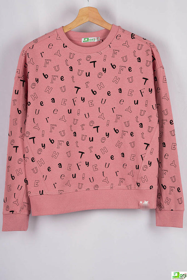 Girl's crew neck casual fit full sleeve jumper in peachy pink colour.