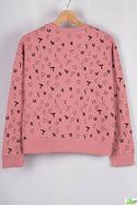 Girl's crew neck casual fit full sleeve jumper in peachy pink colour.