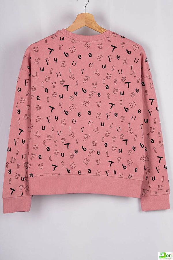 Girl's crew neck casual fit full sleeve jumper in peachy pink colour.