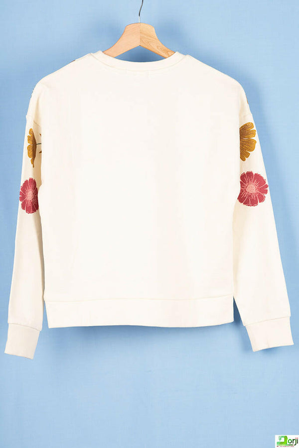 Girl's crew neck full sleeve jumper in Off white colour.