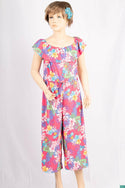 Girl’s colourful floral soft off shoulder sleeveless jumpsuit on Pink with a Stretchable waist and elastane body. 