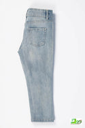 Girl's Regular fit Ripped Jeans in Faded Denim Blue.