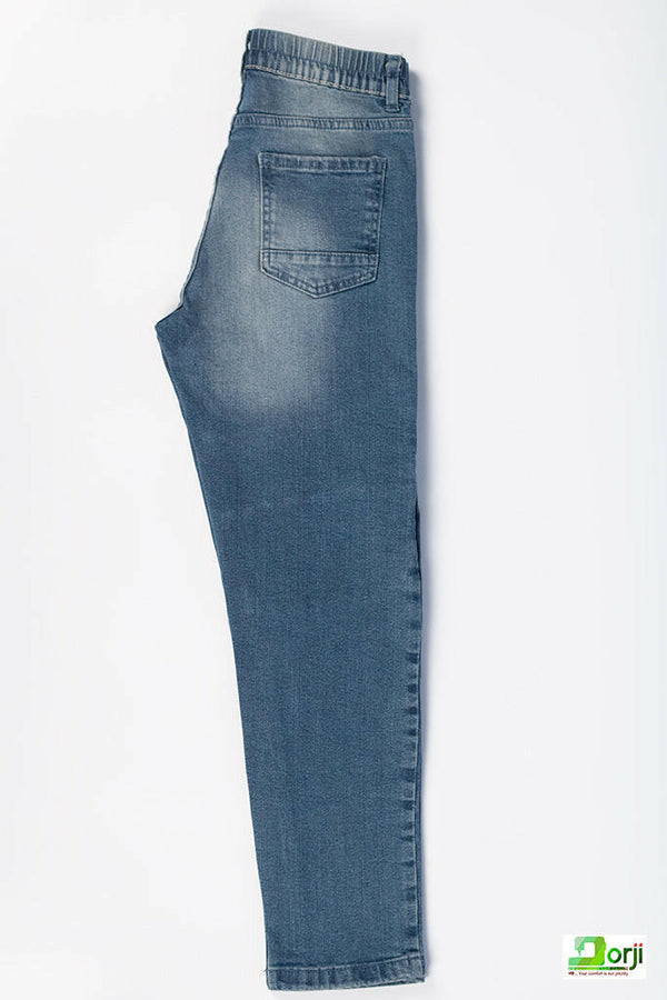Girl's Regular fit Ripped faded Jeans in Denim Blue.