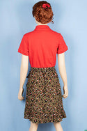Ladies casual fit short length Stylish skirts in black orange leopard prints on Olive.