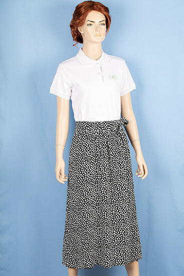 Ladies casual fit mid length stylish double part skirts with pockets in White spotty print on black.