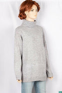 Ladies full sleeve high neck loose fit sweater.