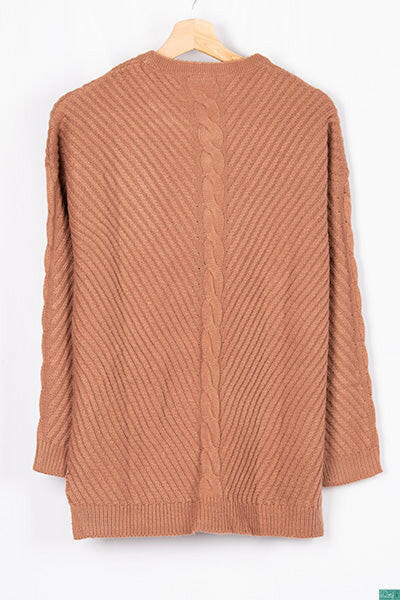 Ladies full sleeve casual fit baggy design round neck knitwear.
