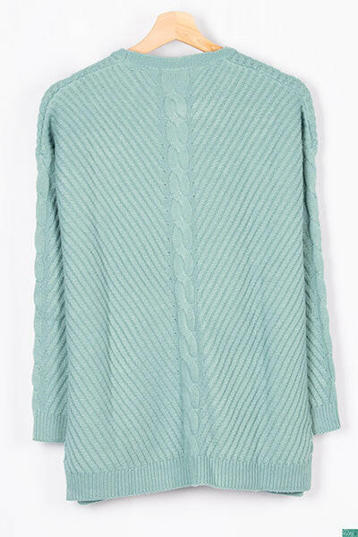 Ladies full sleeve casual fit baggy design round neck knitwear.