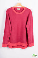 Women’s full sleeve round neck loose fit winter knit sweater.