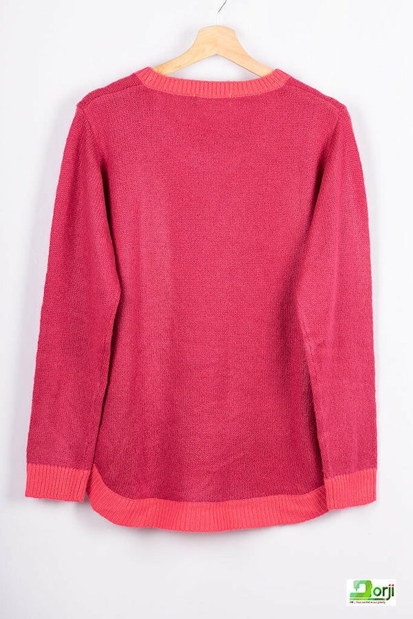 Women’s full sleeve round neck loose fit winter knit sweater.