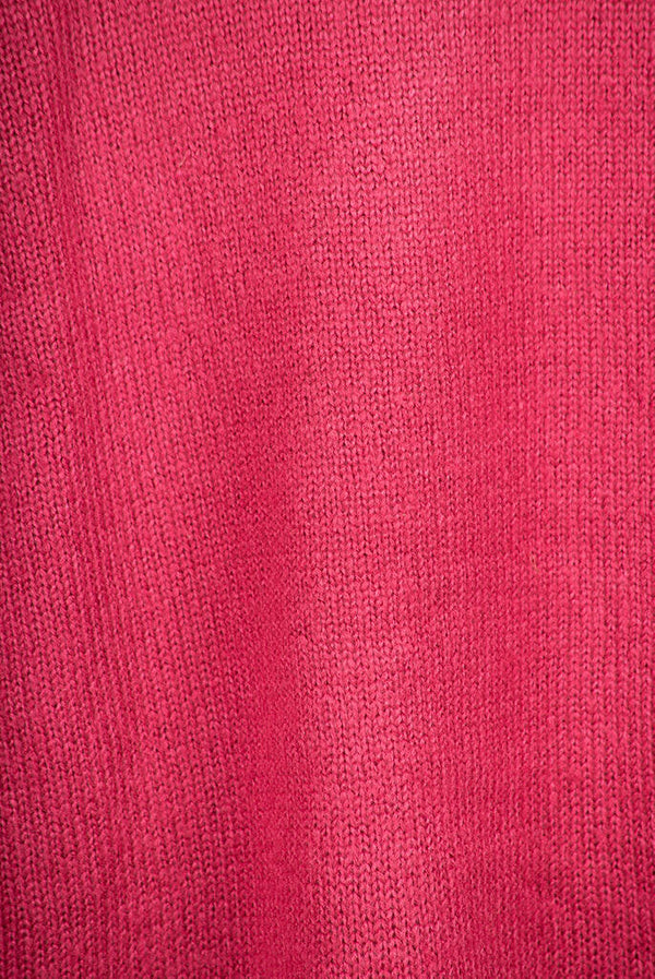 Women’s full sleeve round neck loose fit winter knit sweater.