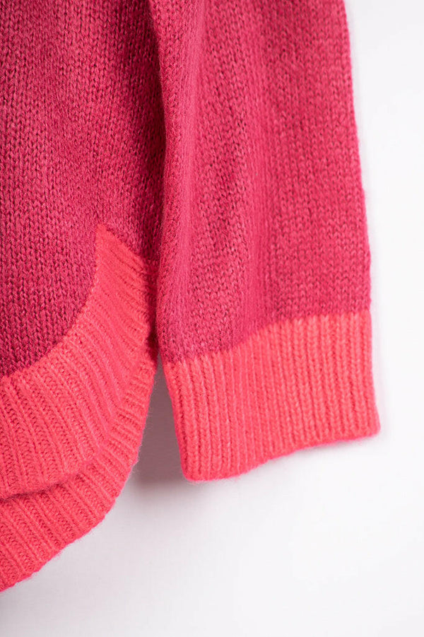 Women’s full sleeve round neck loose fit winter knit sweater.