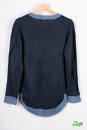 Women’s full sleeve round neck loose fit winter knit sweater.