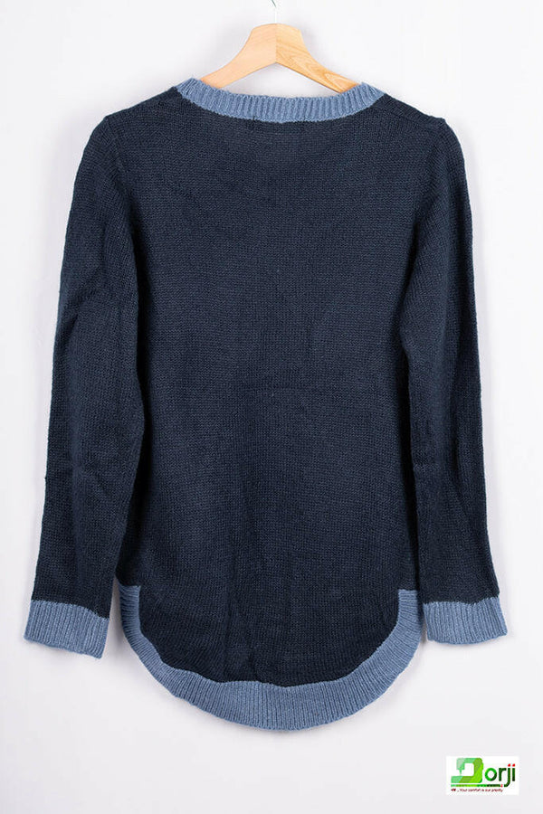Women’s full sleeve round neck loose fit winter knit sweater.