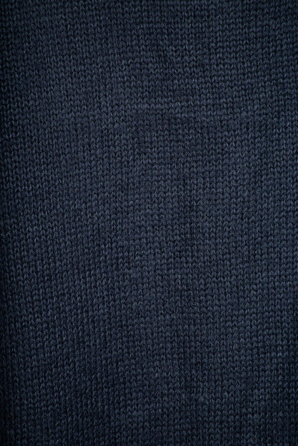 Women’s full sleeve round neck loose fit winter knit sweater.