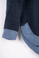 Women’s full sleeve round neck loose fit winter knit sweater.