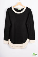 Women’s full sleeve round neck loose fit winter knit sweater.