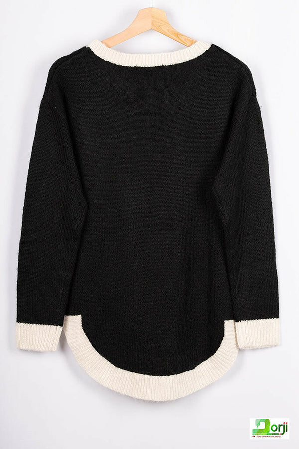 Women’s full sleeve round neck loose fit winter knit sweater.