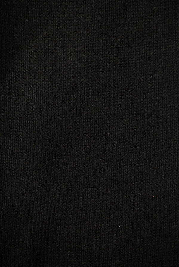 Women’s full sleeve round neck loose fit winter knit sweater.