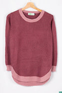 Women’s full sleeve round neck loose fit winter knit sweater.