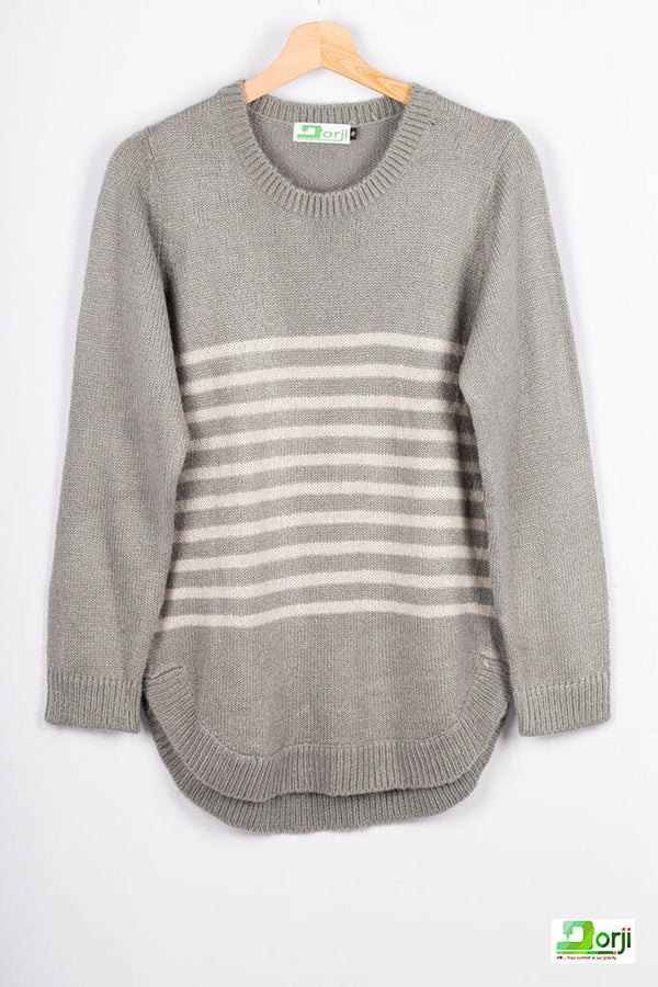 Women’s full sleeve round neck loose fit winter knit sweater.