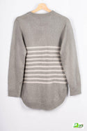 Women’s full sleeve round neck loose fit winter knit sweater.