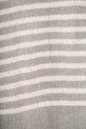 Women’s full sleeve round neck loose fit winter knit sweater.