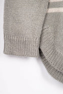 Women’s full sleeve round neck loose fit winter knit sweater.