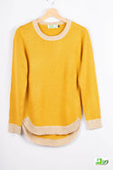 Women’s full sleeve round neck loose fit winter knit sweater.