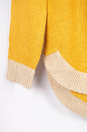 Women’s full sleeve round neck loose fit winter knit sweater.