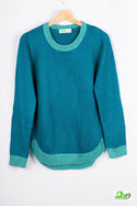 Women’s full sleeve round neck loose fit winter knit sweater.
