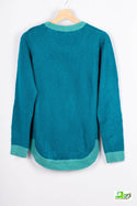 Women’s full sleeve round neck loose fit winter knit sweater.