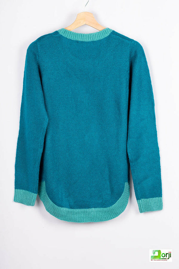 Women’s full sleeve round neck loose fit winter knit sweater.