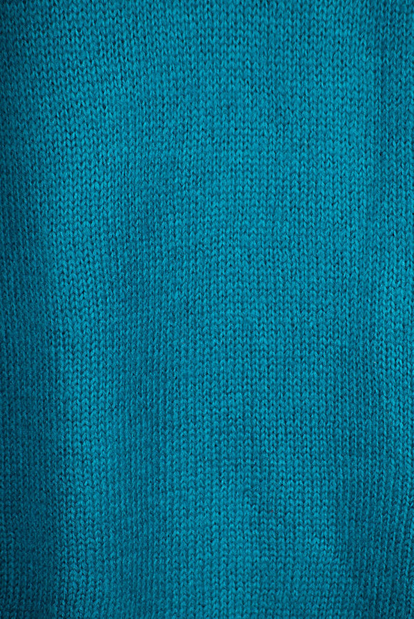 Women’s full sleeve round neck loose fit winter knit sweater.
