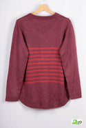 Women’s full sleeve round neck loose fit winter knit sweater.