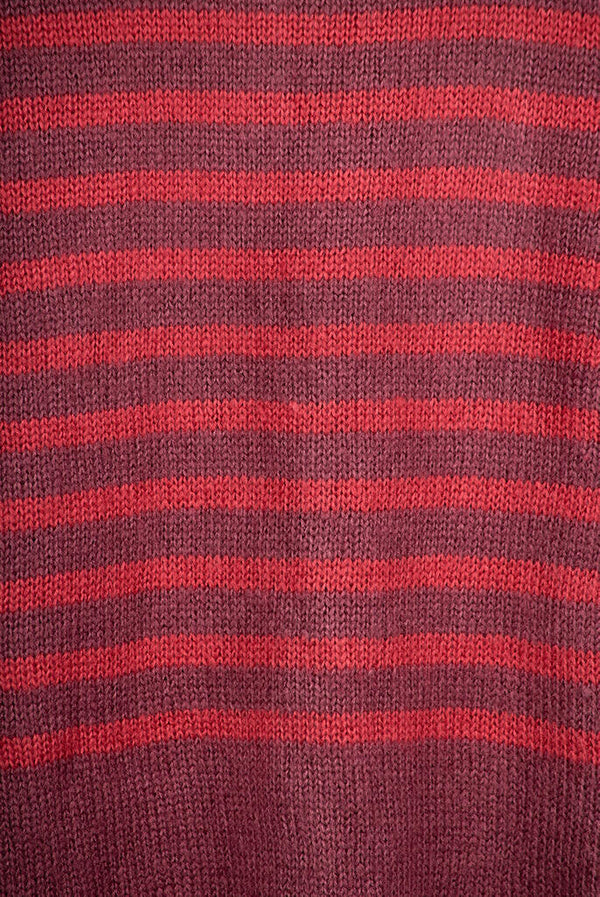 Women’s full sleeve round neck loose fit winter knit sweater.