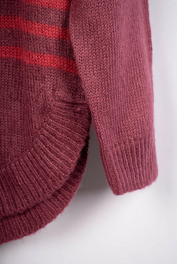 Women’s full sleeve round neck loose fit winter knit sweater.