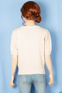 Ladies half sleeve casual fit V neck woollen cardigan.