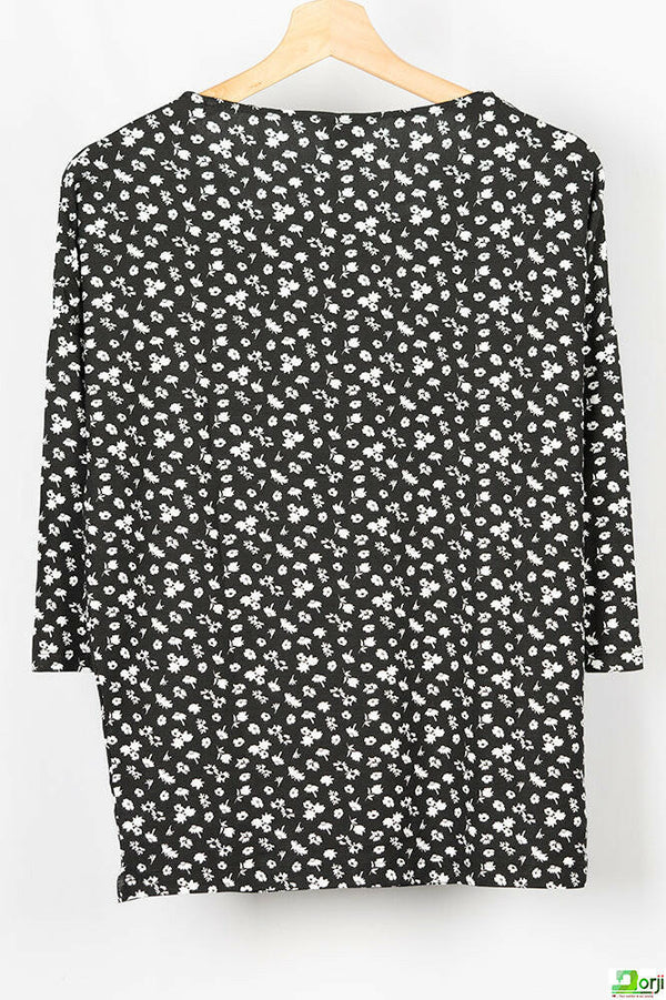 Ladies loose fit half sleeve round neck white floral long top in Black. A beautiful comfy top with 100% cotton.