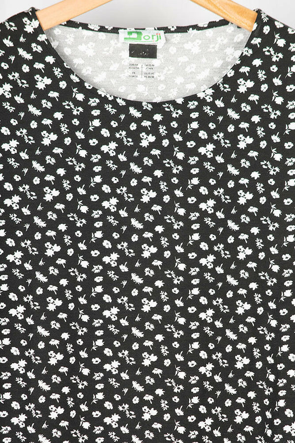 Ladies loose fit half sleeve round neck white floral long top in Black. A beautiful comfy top with 100% cotton.