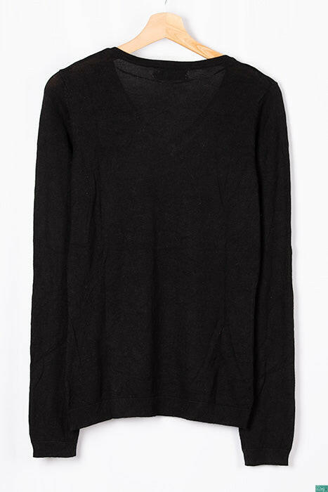 Ladies full sleeve casual fit V neck knitwear.