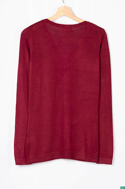 Ladies full sleeve casual fit V neck knitwear.