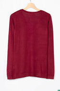 Ladies full sleeve casual fit V neck knitwear.