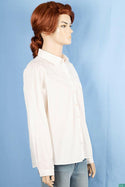Ladies full sleeve casual fit collar shirt with pleated designed chest.