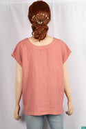 Ladies sleeveless V neck loose fit regular use tops.