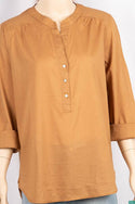 Ladies cuffed V neck buttoned loose fit regular use tops.