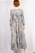 Ladies Smokey ruffles full sleeve double layered long dress in various colours print with a huge, beautiful flares and also can tie up with a fashionable belt of feather.