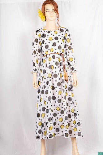 Ladies Smokey ruffles full sleeve double layered long dress in various colours print with a huge, beautiful flares and also can tie up with a fashionable belt of feather.