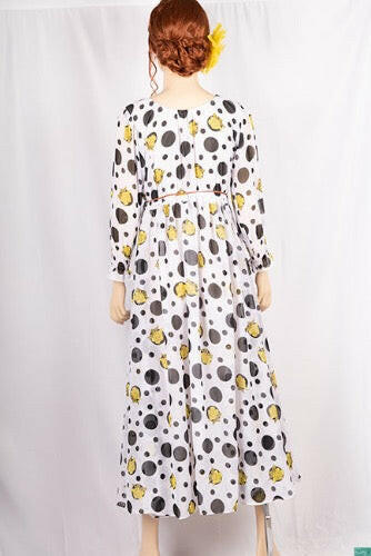 Ladies Smokey ruffles full sleeve double layered long dress in various colours print with a huge, beautiful flares and also can tie up with a fashionable belt of feather.