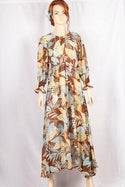 Ladies Smokey ruffles full sleeve double layered long dress in various colours print with a huge, beautiful flares and also can tie up with a fashionable belt of feather.